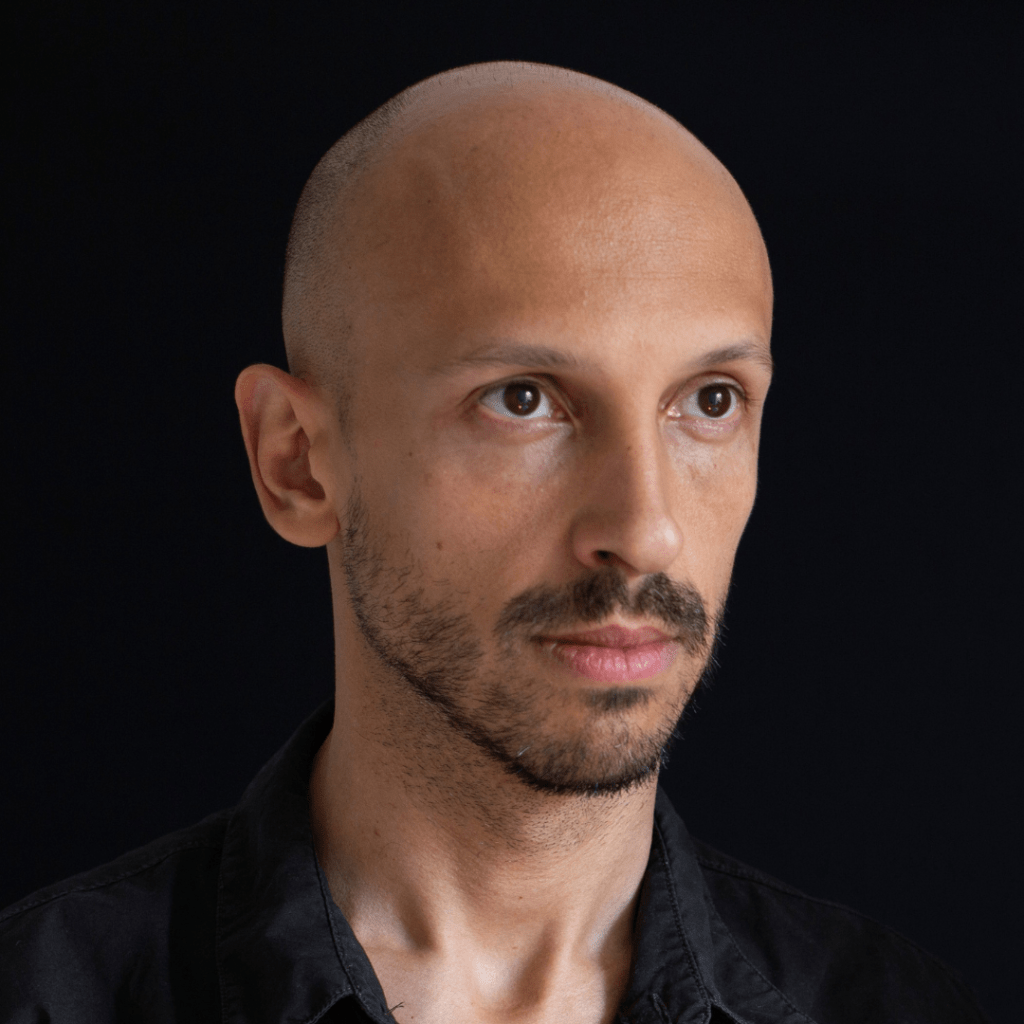 Filipe dos Santos Barrocas is a visual artist and professor with a 
Ph.D. in Visual Poetics from ECA-USP. His work, which focuses on installations and is 
influenced by the performing arts, primarily addresses issues related to the expanded field 
of photography, its various media, memory, and history. His work has been exhibited in several shows across Portugal and at Rotterdam 
Photo in 2022. He was awarded the ProAC Expresso Lei Aldir Blanc Prize in 
2020, through which he produced the film *Labirinto* (2023). His dissertation explored the relationship between photography and literature. He has been a member of the 
Photographic Printing Research Group since 2015. As an educator, he has taught 
photography at NAFIST, ECA, and SESC, and was also part of the Vocational Program of the 
São Paulo Municipal Department of Culture in 2020 and 2022.